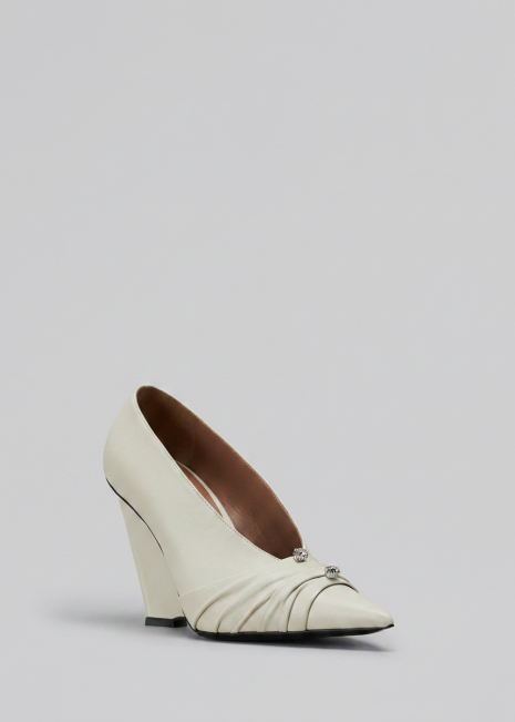White Wedge Pump Front-Side on Light Grey Background